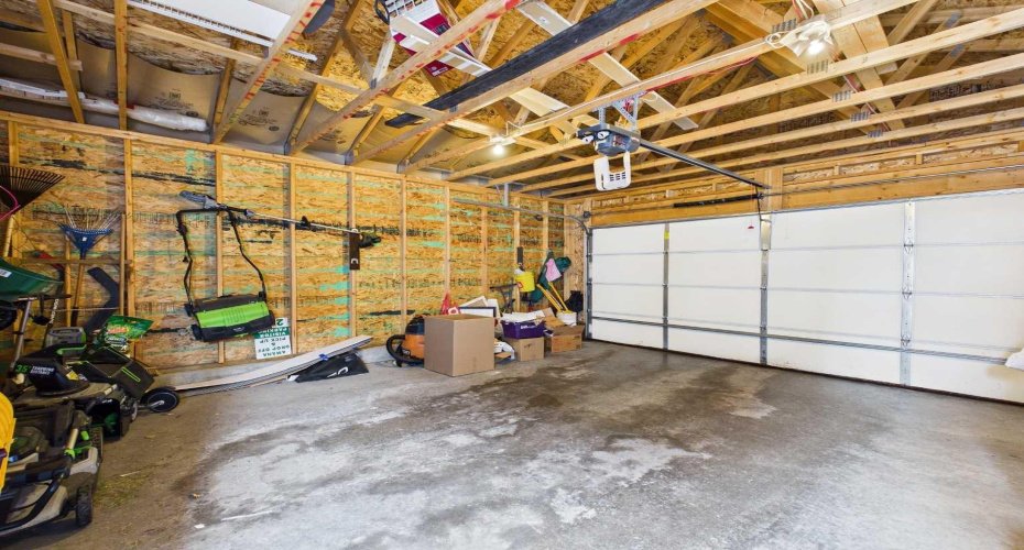 Double Detached Garage: Generously sized double garage with ample space to comfortably accommodate two vehicles, offering convenient parking and additional storage potential.