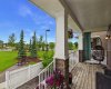 Relax on the Front Porch and Enjoy Unobstructed Greenspace Views.