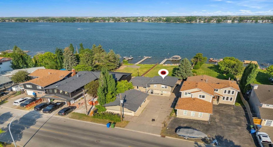 700 West Chestermere Drive, Chestermere, Alberta T1X 1B5, 4 Bedrooms Bedrooms, ,3 BathroomsBathrooms,Residential,For Sale,West Chestermere,A2326508