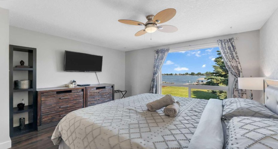 700 West Chestermere Drive, Chestermere, Alberta T1X 1B5, 4 Bedrooms Bedrooms, ,3 BathroomsBathrooms,Residential,For Sale,West Chestermere,A2326508