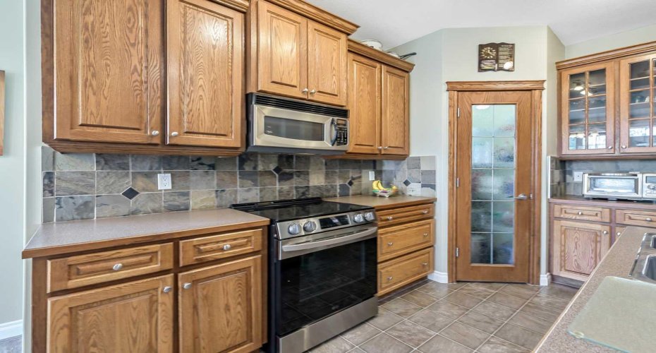14 Cimarron Park Cove, Okotoks, Alberta T1S 2L8, 4 Bedroom Bedrooms, 0 ,3 BathroomBathrooms,Residential,For Sale,Cimarron Park,0,A2326528
