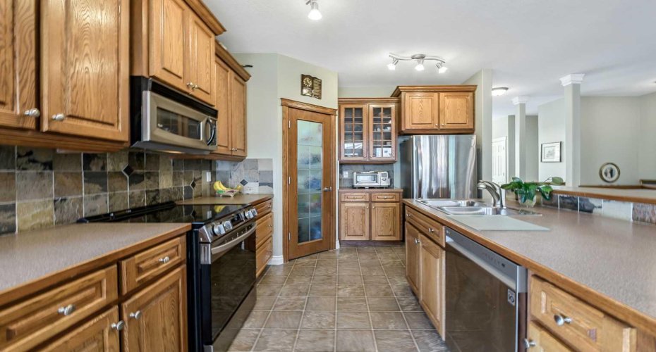 14 Cimarron Park Cove, Okotoks, Alberta T1S 2L8, 4 Bedroom Bedrooms, 0 ,3 BathroomBathrooms,Residential,For Sale,Cimarron Park,0,A2326528