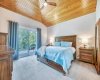 Primary Bedroom with Lake Views & Private Deck Access