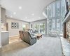 Walk-Out Basement with a Wall of Windows Open to Above