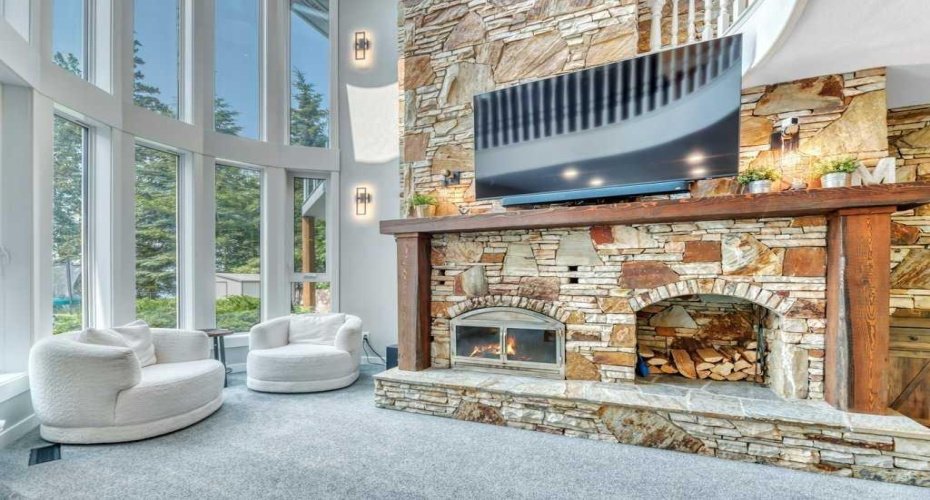 Amazing Wood Burning Fireplace with Views out to the Lake