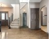 Staircase to Upstairs & Door to Basement