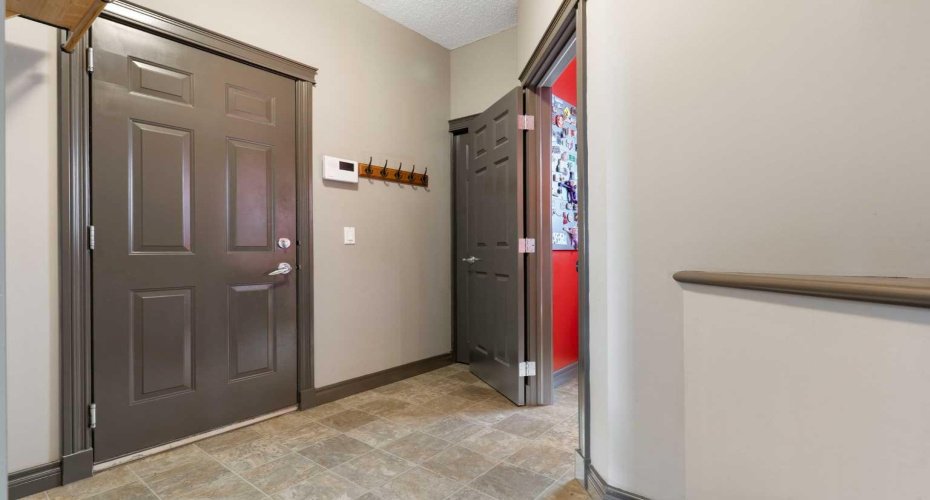 Mudroom Entry to Attached Double Garage and 1/2 Bath