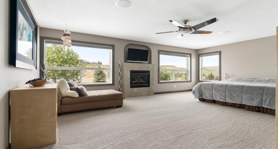 Primary Bedroom with Gas Fireplace - Golf Course Views