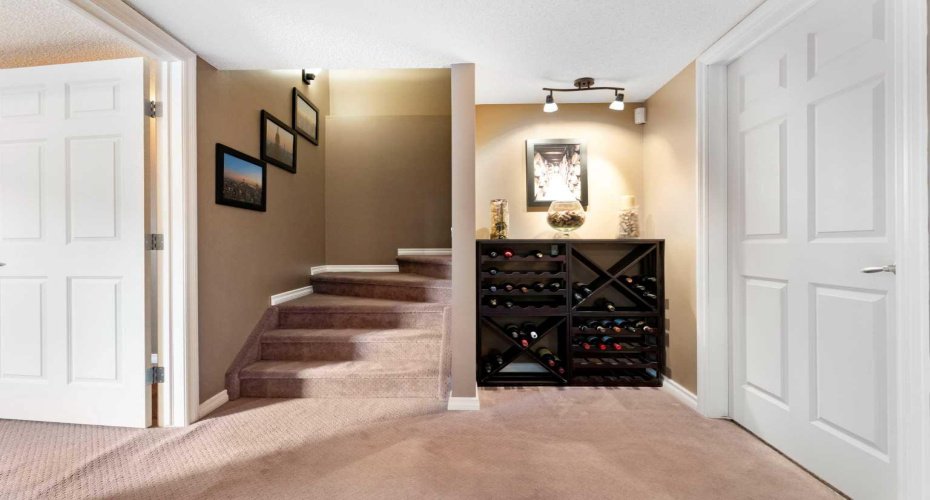 Entering Basement Living from Stairs Down From Main Floor
