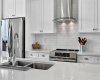 Independent hood fan with ceiling height select ceramic tile backsplash