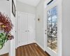 Mud room with large closet and glass french door leading to deck.
