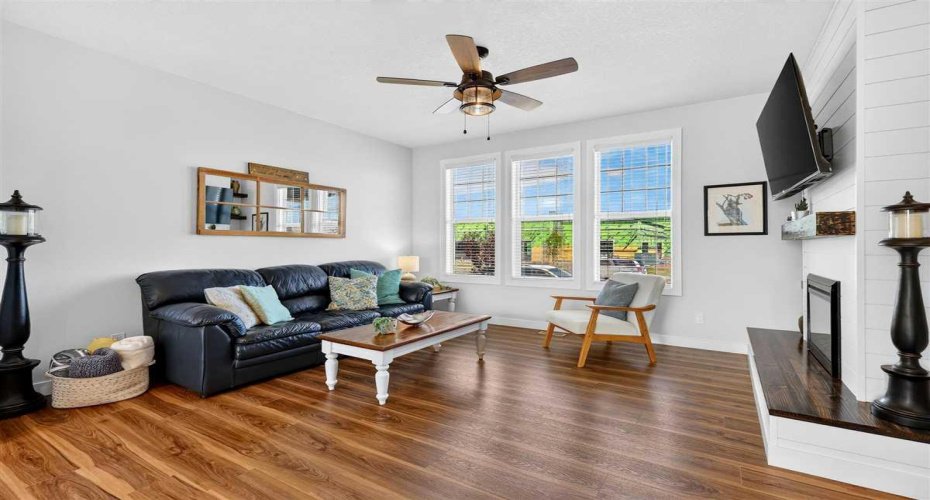 Luxury vinyl plank flooring throughout the entire house with carpet in the upstairs bedrooms.