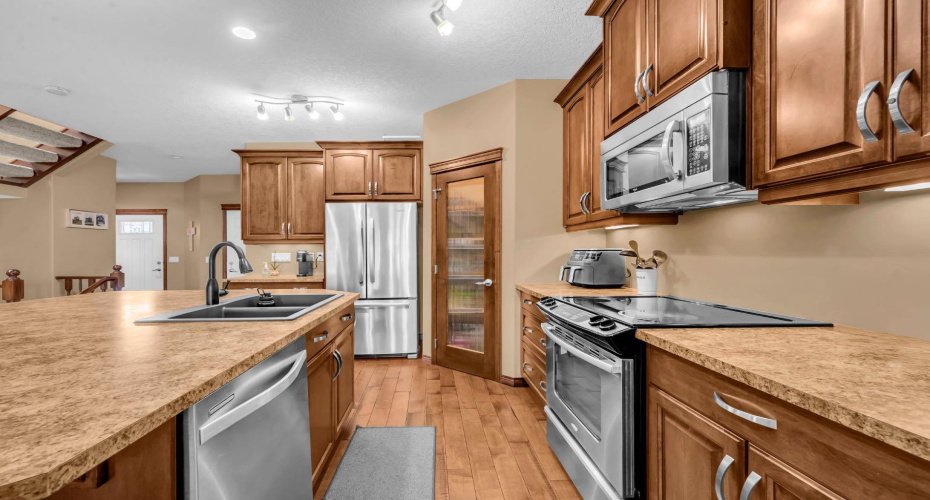 1011 Kings Heights Road, Airdrie, Alberta T4A0M5, 4 Bedroom Bedrooms, 0 ,4 BathroomBathrooms,Residential,For Sale,Kings Heights,0,A2326841