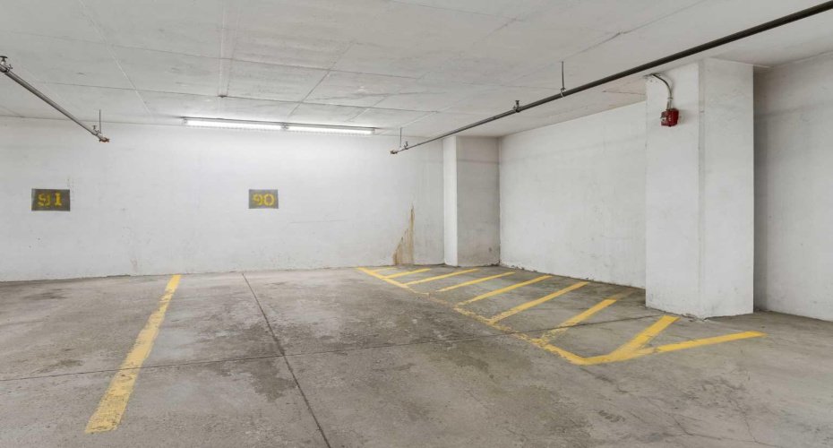 Extra wide, titled parking stall
