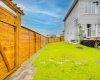 Wide gate to back yard