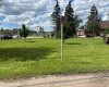 View of the green space from the back alley