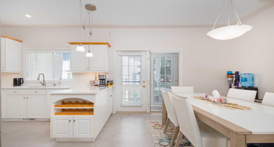 Kitchen + dining area with balcony