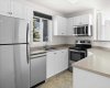 Updated kitchen with stainless steel appliances and newer kitchen sink