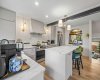 Another view of this fabulous kitchen. Note the lighting in this space with brass accents.