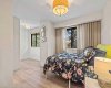 The 4th level is home to the spacious second bedroom.