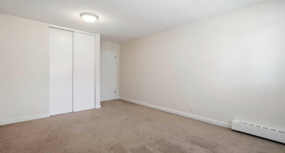 Primary bedroom with a good size closet