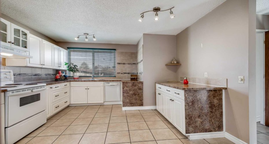 248 Huntcroft Road, Calgary, Alberta T2K 4E2, 4 Bedroom Bedrooms, 0 ,2 BathroomBathrooms,Residential,For Sale,Huntcroft,0,A2327194