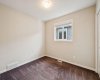 Offering a functional layout and cozy atmosphere, this spacious third bedroom adapts easily to your family's changing needs.