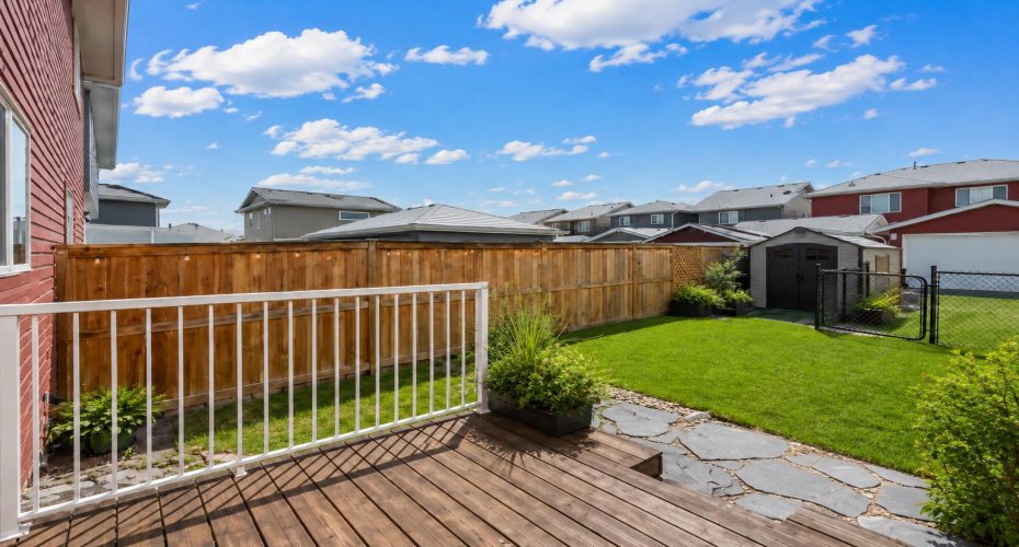 Step outside to a PRIVATE, FULLY FENCED backyard where the spacious deck is perfect for summer BBQs, morning coffee, or relaxing while overlooking the beautifully maintained yard.