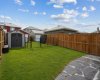 Designed for easy outdoor living, the SUNNY backyard offers plenty of room for kids, pets, and entertaining, complete with a STORAGE SHED and attractive stone layout.