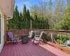 Deck is surrounded by trees