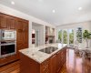 A chef's dream with a 36" electric cooktop and built-in wall oven and microwave