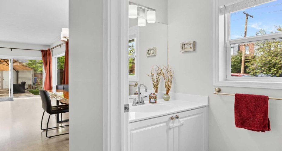A convenient and updated main floor powder room, bright and well appointed for guests.