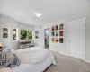 A serene primary retreat with room to unwind, a dedicated reading or work nook, and direct access to the ensuite.