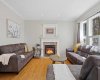 Main floor sitting room with fire place