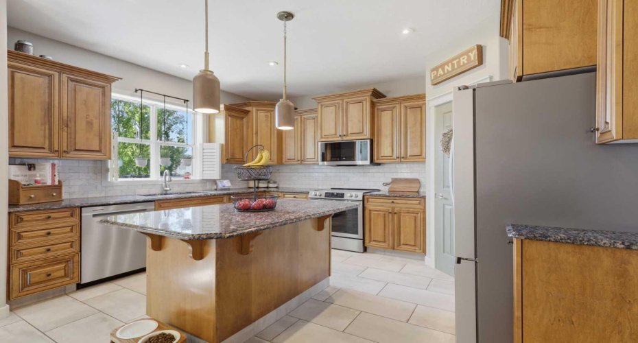 Kitchen with Granite and Maple cabinets