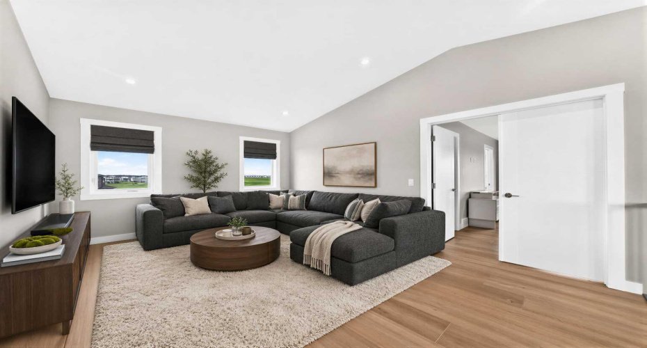 Upstairs bonus room.  Virtually staged