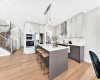 KITCHEN WITH ISLAND.   Virtually staged