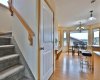 Staircase to Upper Level & Into Kitchen