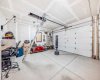 Heated Triple Garage/Workshop with pull-down ladder for huge attic storage
