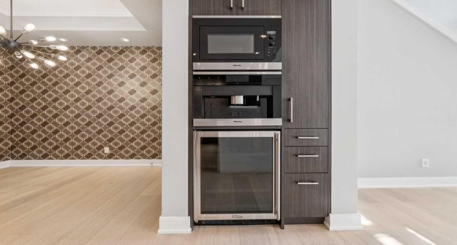 Built-in wine fridge, coffee maker and microwave.