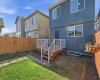 Deck with railings and landscaped yard