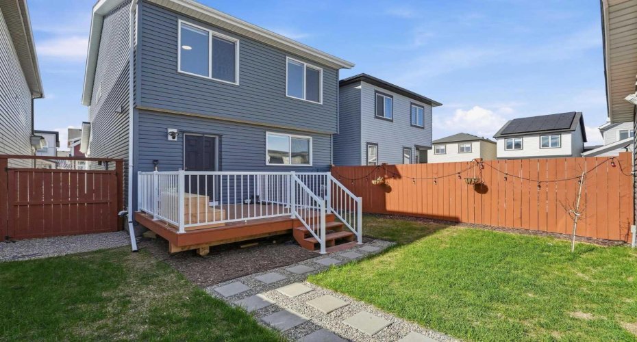 Paved walkway leads to garage