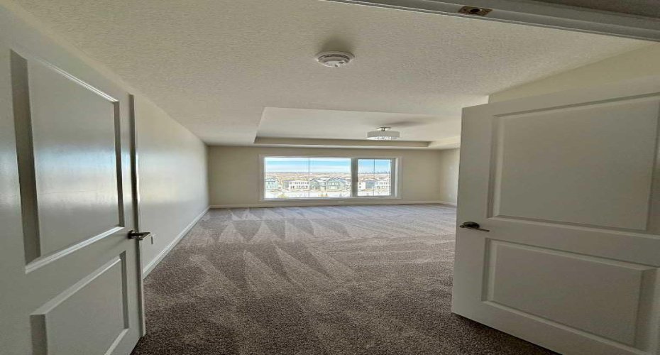 Photos are of property address Versant Rise SW, same Montay II floor plan as 695 Buffaloberry Manor. Photos are representative for layout only, colours and finishes may vary.