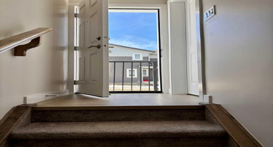 Photos are of property address Versant Rise SW, same Montay II floor plan as 695 Buffaloberry Manor. Photos are representative for layout only, colours and finishes may vary.