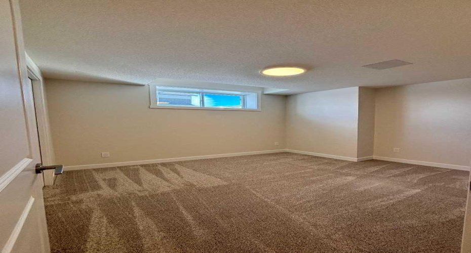 Photos are of property address Versant Rise SW, same Montay II floor plan as 695 Buffaloberry Manor. Photos are representative for layout only, colours and finishes may vary.