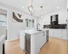Extensive custom cabinetry provides abundant storage while enhancing the home's contemporary appeal.