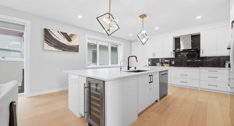 Extensive custom cabinetry provides abundant storage while enhancing the home's contemporary appeal.
