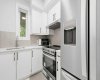 Premium appliance package in the spice kitchen delivers both performance and sophistication.
