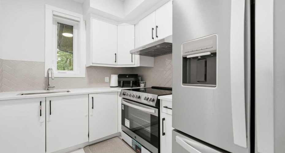 Premium appliance package in the spice kitchen delivers both performance and sophistication.
