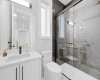Stylishly finished bathroom features contemporary fixtures and quality craftsmanship.